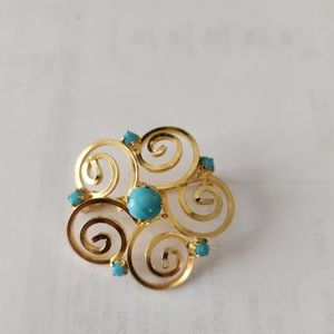 Austria gold tone brooch